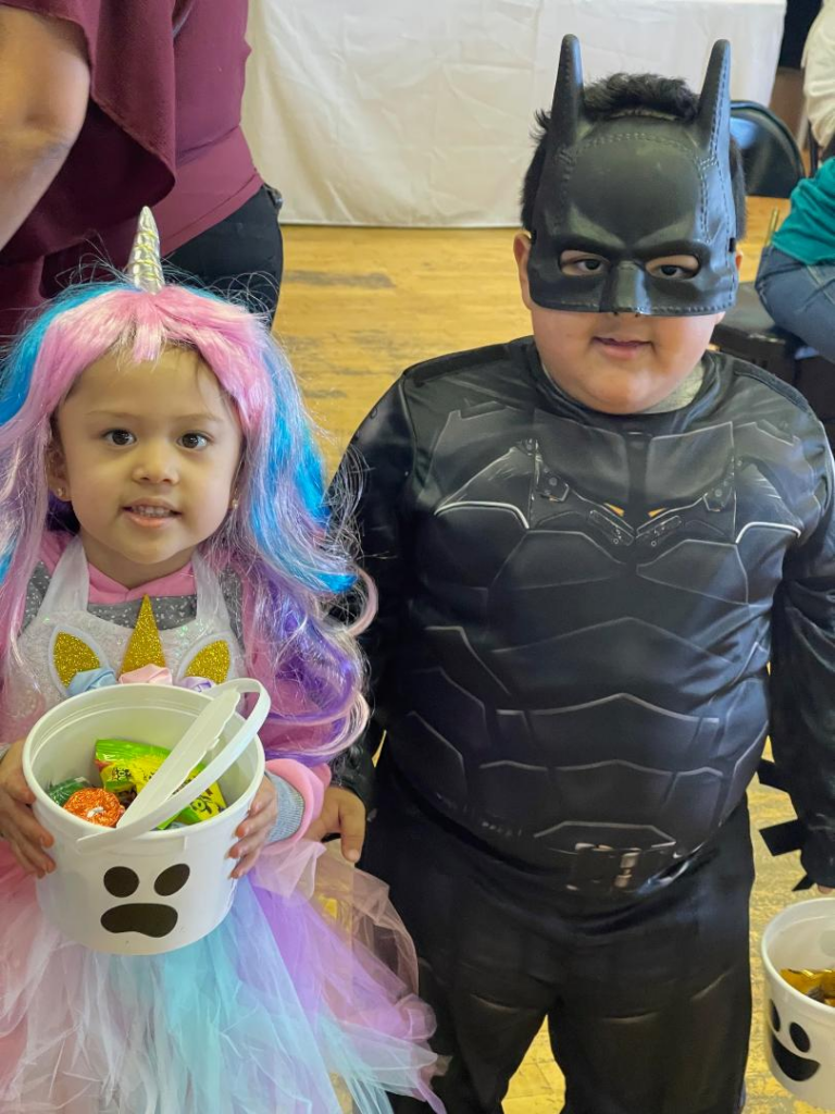 two kids in Halloween costumes